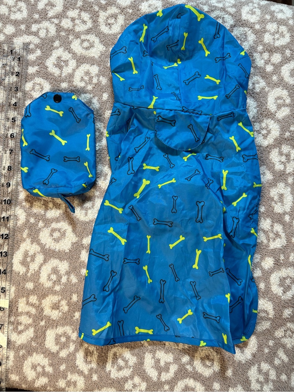 Blue Dog Raincoat with Neon Bone Print